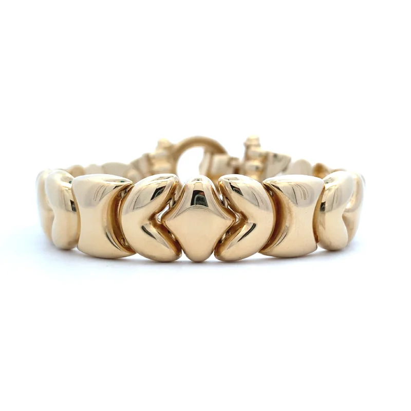 Elegant Silver Bracelet with Floral Detailing-Estate Fancy Link Bracelet in Yellow Gold